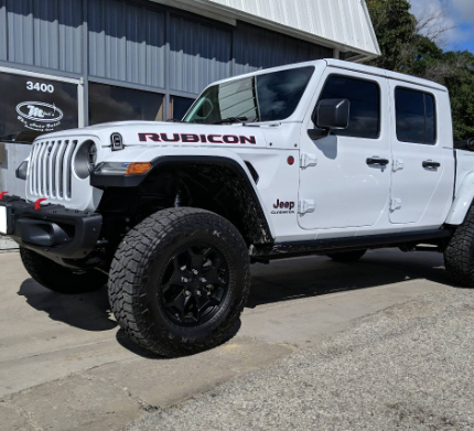 Mitch's Automotive Building with Jeep